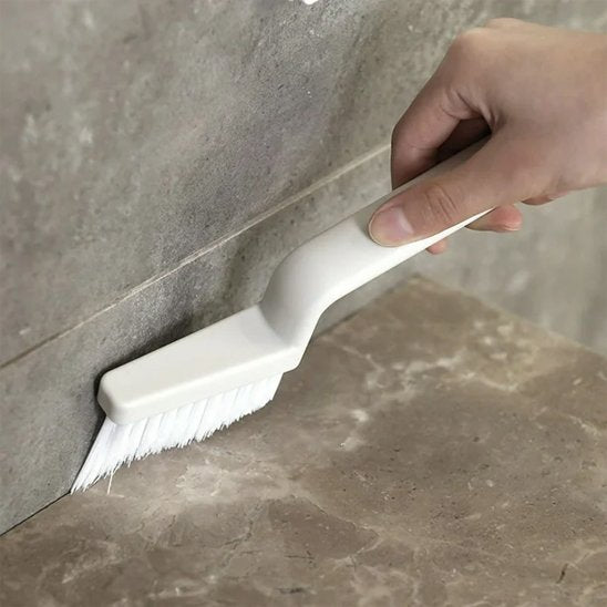 Manche courbé brosse à joints pour accès aux angles difficiles